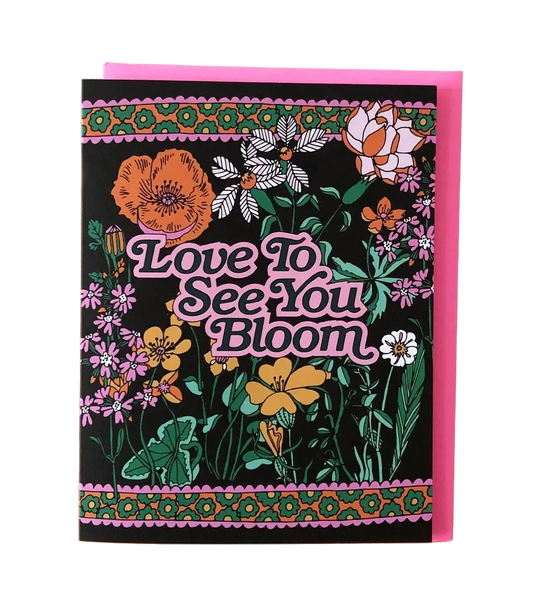 Greeting card with floral design and 'Love to See You Bloom' text on a colorful background