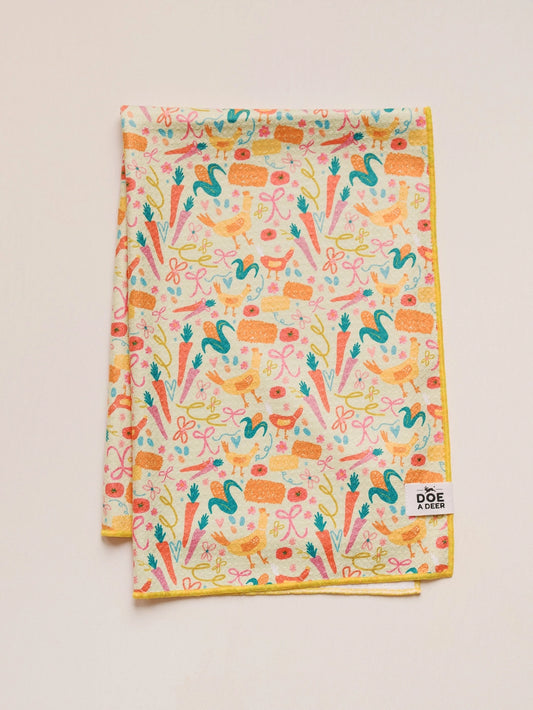 Towel with colorful spring farm design 