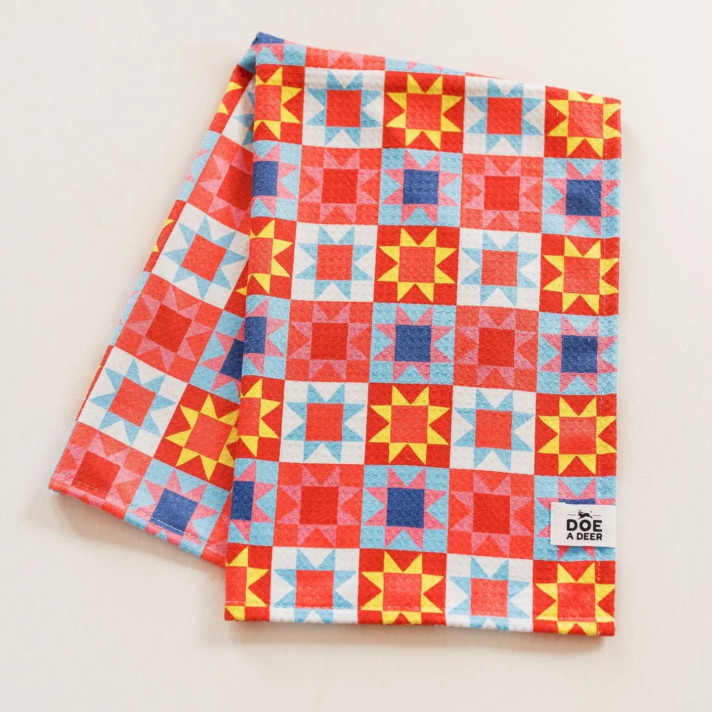 Colorful quilt patterned towel