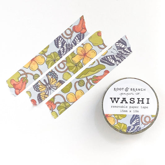Front cover of Washi tape roll. Three pieces of tape with nasturtium and butterfly patterns on them.