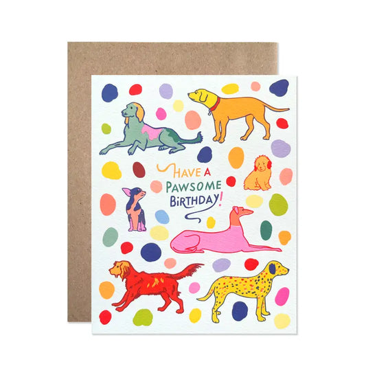 White greeting card with colorful dog illustrations and 'Have a Pawsome Birthday!' text