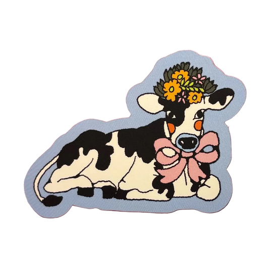 Sticker of a cow with a flower crown and bow on a pink background