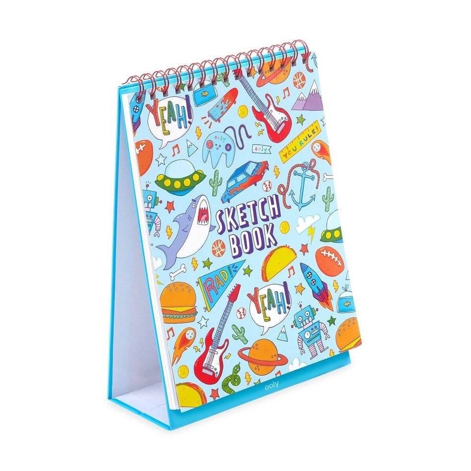 Blue sketchbook cover with various colorful illustrations