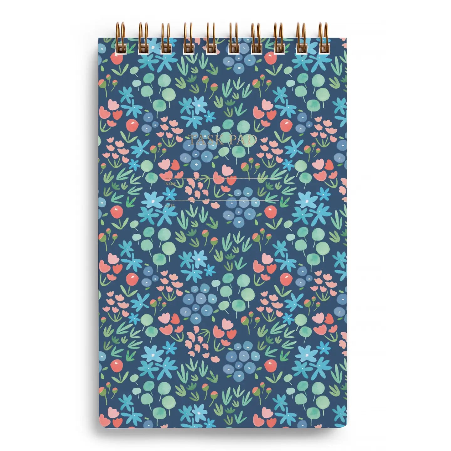 Top spiral notebook with floral pattern on a blue background
