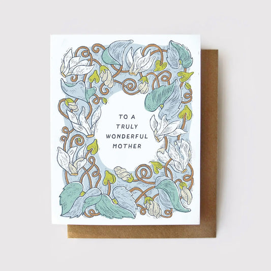 White card with blue, green, white floral pattern. Black text reads "to a truly wonderful mother" 