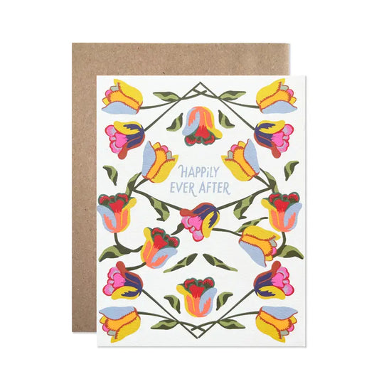Greeting card with colorful tulip design and 'Happily Ever After' text, brown envelope.