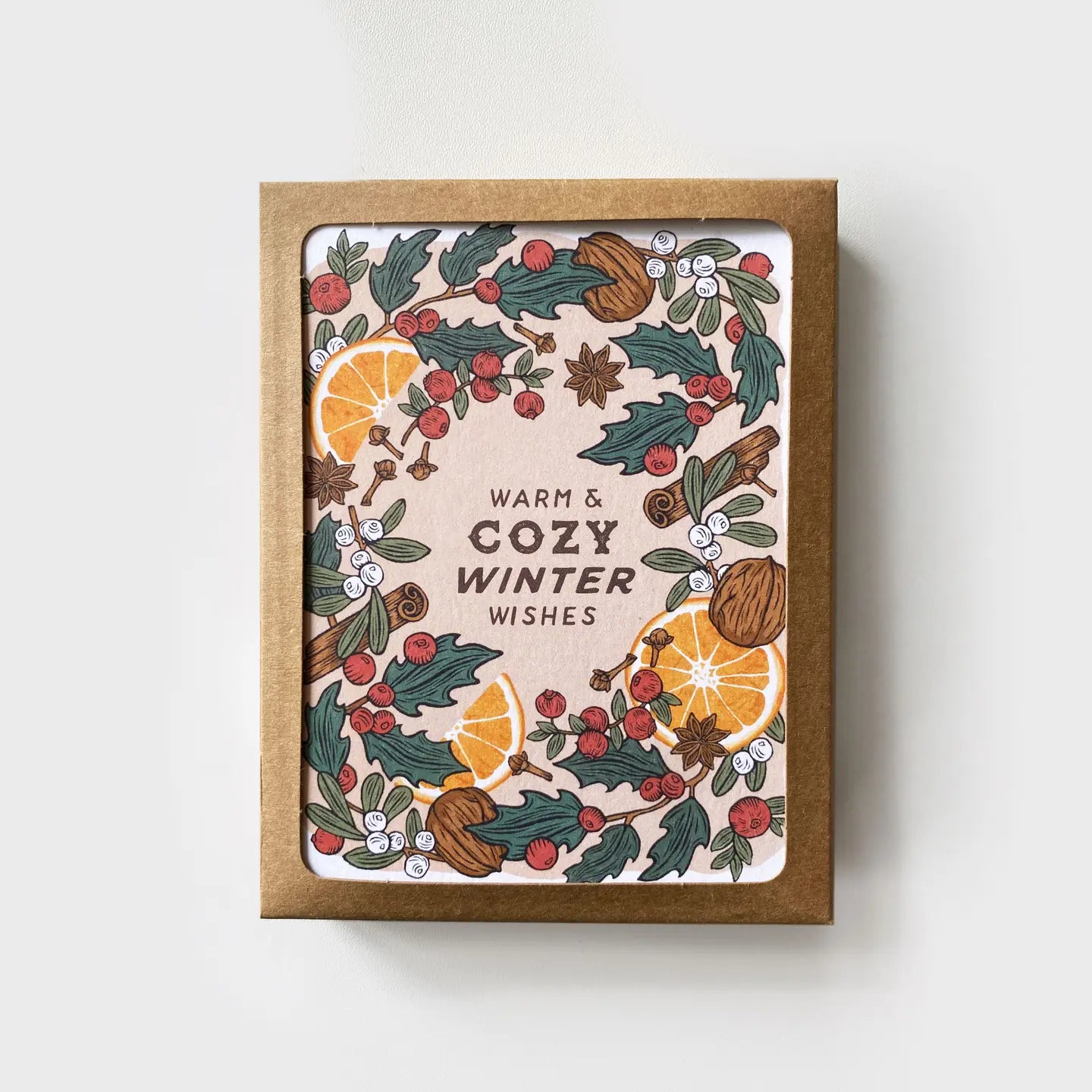 Card with winter-themed design and text 'Warm & Cozy Winter Wishes' in a brown Kraft box 
