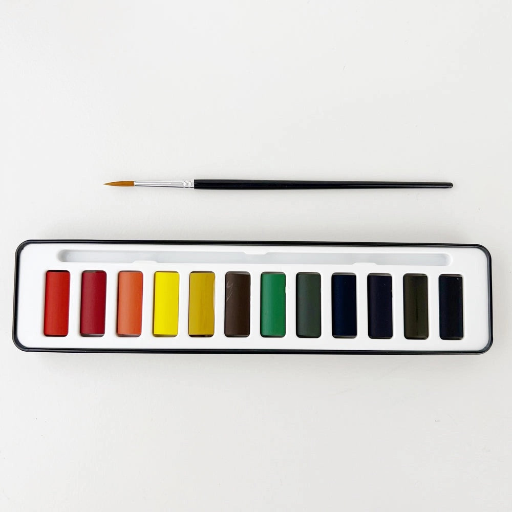Watercolor paint palatte. 12 different colors. Paint brush included. 