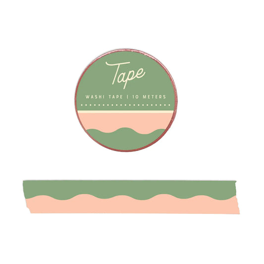 Washi tape with wavy green and pink design on a white background