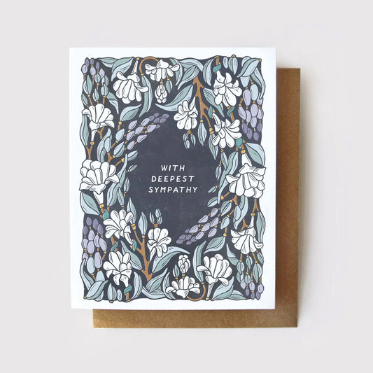 White sympathy card with navy, white, and soft green and purple floral illustrations, white text “with deepest sympathy”
