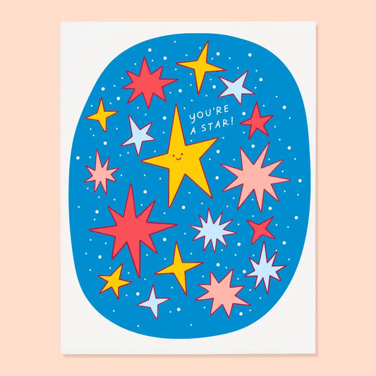 White greeting card with multicolor star illustrations. Text: you’re a star! 