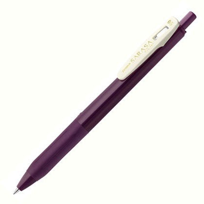 Retractable black pen with a dark purple barrel and cream-colored clip. 