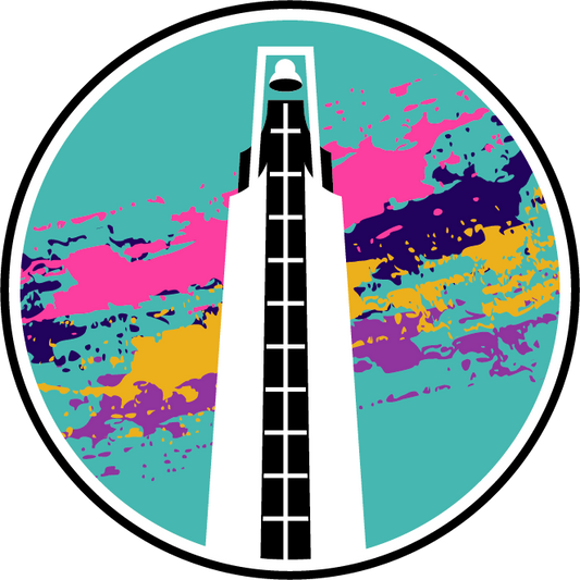 Turqouise circle coaster with a black and white drawing of a bell tower. Pink, navy, mustard, and purple splotches behind the bell tower. 