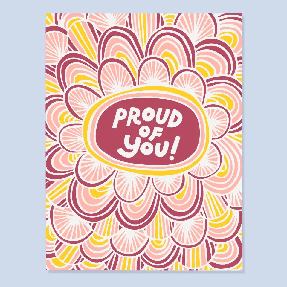 White card with purple, pink and yellow scallops. Purple circle in the middle with white text inside reading "proud of you!" 