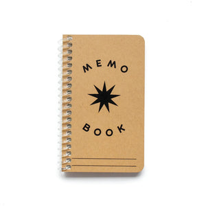 Brown kraft notebook cover. Black ink star drawing and black ink text reads "memo book"