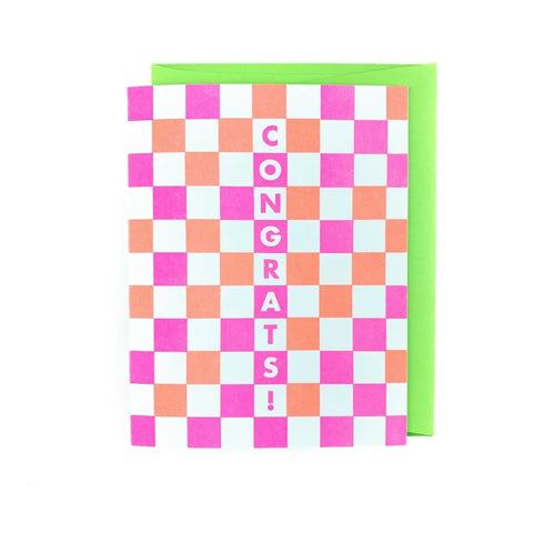 White card with pink and orange checkers. Pink and white text reads "congrats!"