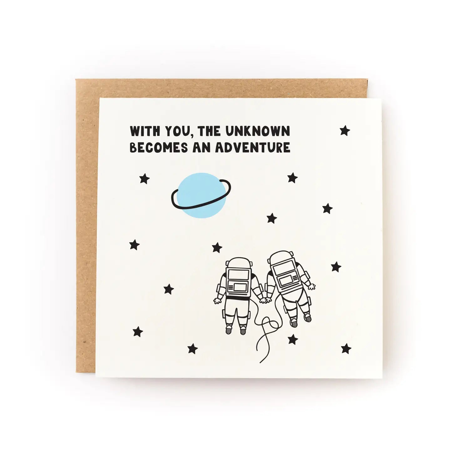 White card with an illustration of two astronauts holding hands and a blue planet. Black text reads "with you, the unknown becomes an adventure"