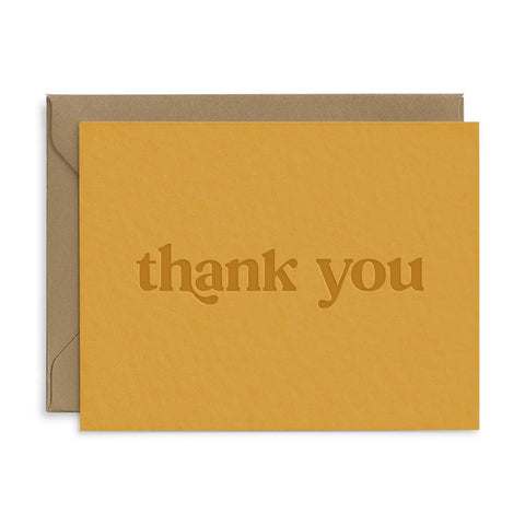 Mustard yellow card with darker yellow text reading "thank you"