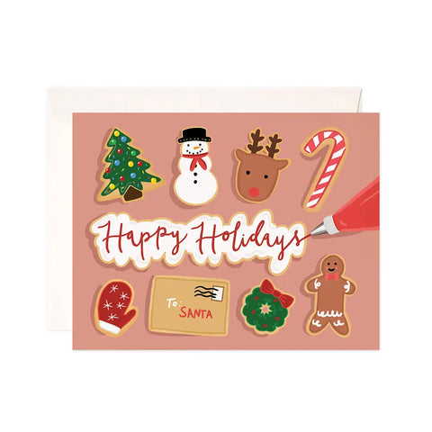 White card with brown background. Illustrations of iced holiday cookies: tree, mitten, snowman, reindeer, wreath, gingerbread man, and candy cane. A cookie spells out with white icing and red lettering "happy holidays"