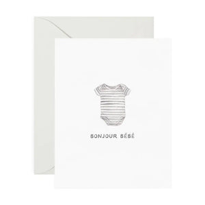 White card with black and white striped onesie. Black text reads "bonjour bebe"
