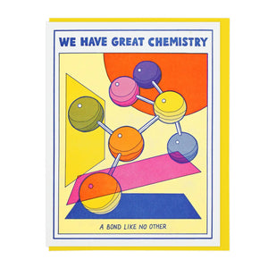 White card with blue text reading "we have great chemistry, a bond like no other." Illustrations of chemical bonds