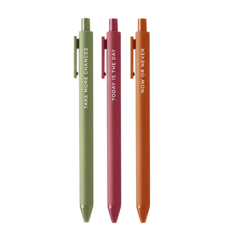 Three pens in the following colors: green, maroon, brown