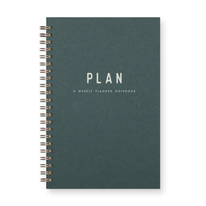 Dark green spiral-bound notebook. White text reads "plan, a weekly planner notebook"
