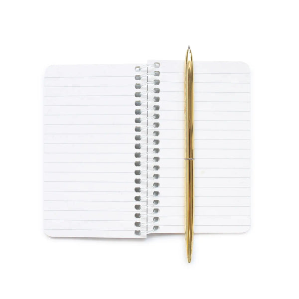 Gold pen and white lined notebook pages