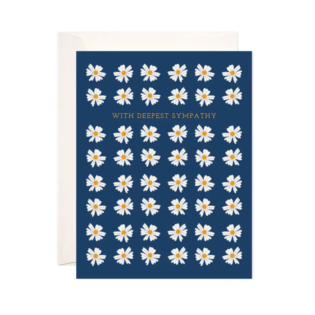 White card with a dark blue background and illustrations of white daisies. Yellow text reads "with deepest sympathy" 