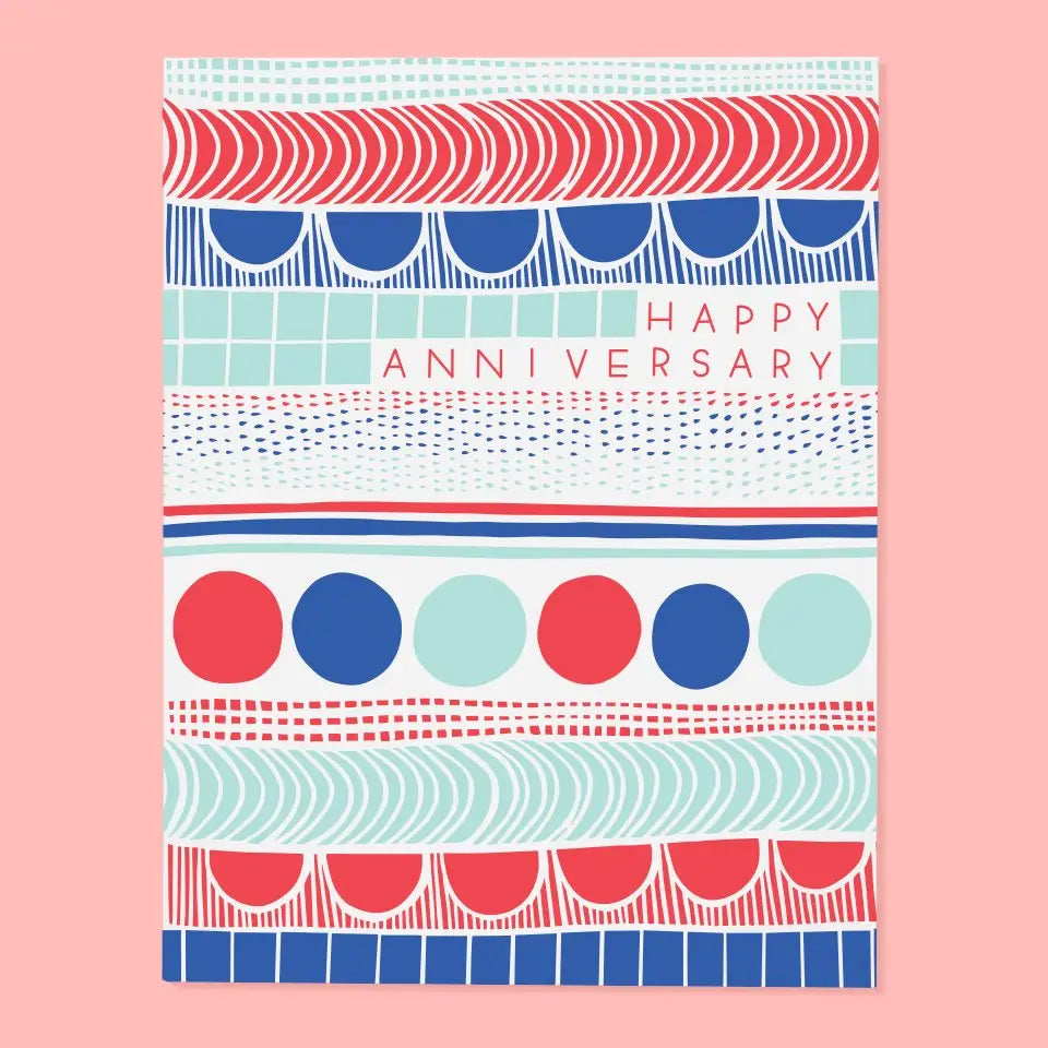 White card with blue, red, and light blue scallops, squares, circles, and lines. Red text reads "happy anniversary" 