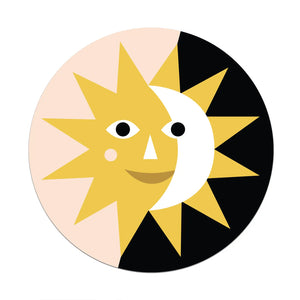 Circle-shaped sticker with a yellow and white sun face on a pink and black background