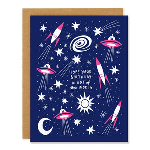 Navy card with white and pink rockets and UFOs. White text reads "hope your birthday is out of this world." Inside of card is white.