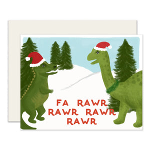 White card with background of snow and evergreen trees. Two green dinosaurs in red santa hats. Red text reads "fa rawr rawr rawr rawr"