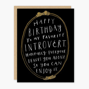 Black card with white text reading "happy birthday to my favorite introvert. Hopefully everyone leaves you alone so you can enjoy it." Card is white inside.