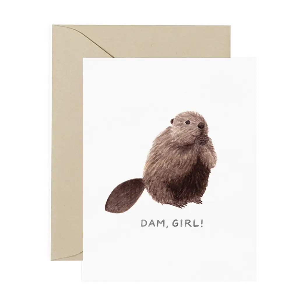 White card with drawing of brown beaver. Black text reads "dam, girl!" 