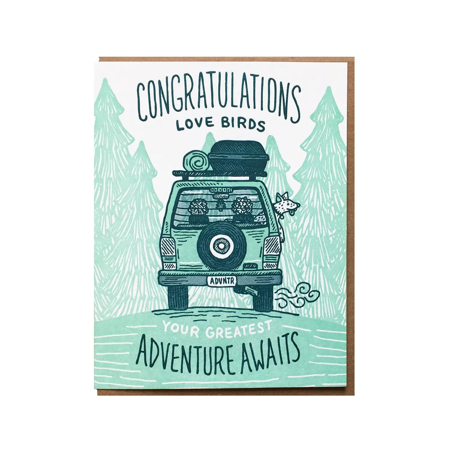 White card with illustrations of turqouise evergreen trees and a packed van with a dog's head sticking out the window. Navy text reads "Congratulations love birds, your greatest adventure awaits 
