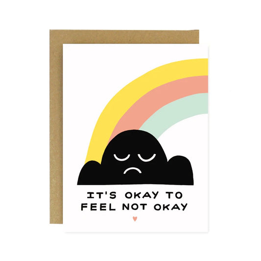 White card with black cloud and rainbow. Black text reads "it's okay to feel not okay"